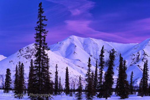 Alaska Range Sunrise 2; the sun reflection off the clouds colored the mountains pink Alaska Range Sunrise 2; This image was taken with the sun reflecting off the clouds, which colored the mountains pink