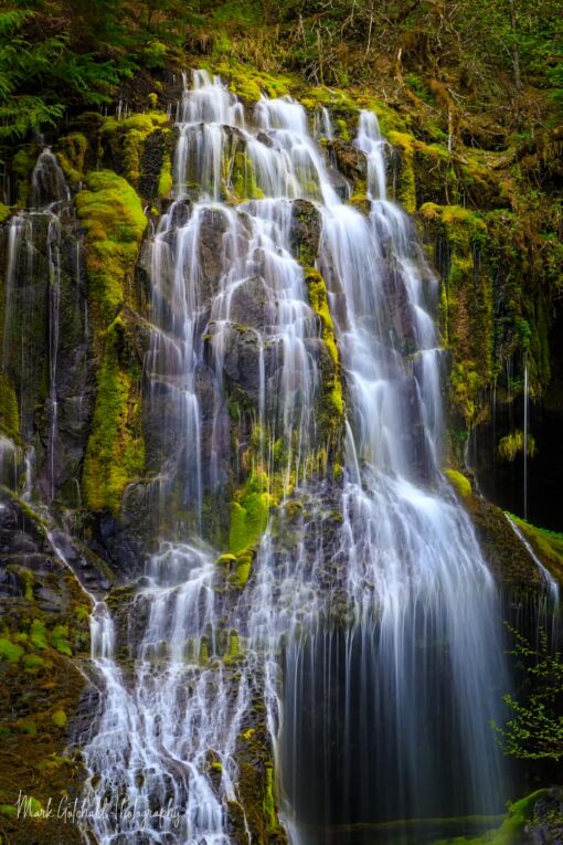 Braided waterfall off a canyon wall, looks like angel hair