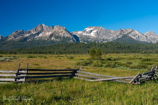 Sawtooth Mountains with a Buck & Rail Fence