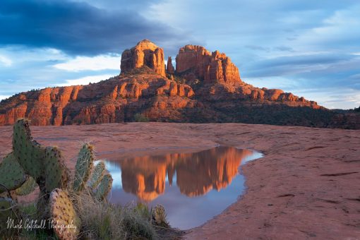 Cathedral Rock Reflection 2 Cathedral Rock, Sedona, Arizona. Reflection is a small pool of rain water, with light from the setting sun lighting up Cathedral Rock.