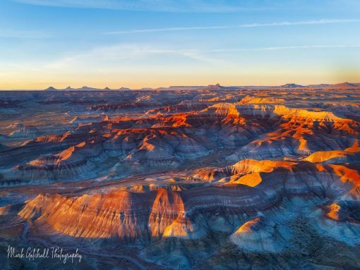 Little Painted Desert Ridges, Lit Up by the Setting Sun Drone photo of the ridges in the Little Painted Desert being lit up by the setting sun