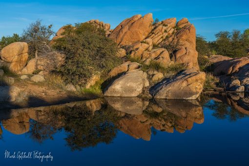 Morning at Watson Lake, Prescott, Arizona Granite boulders are reflected in Watson Lake on a calm morning