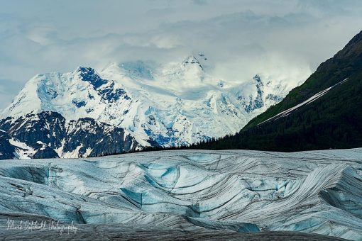 Majestic glacier with snowy mountains.